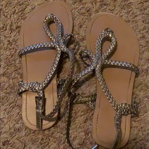 Tan base with silver strap sandals